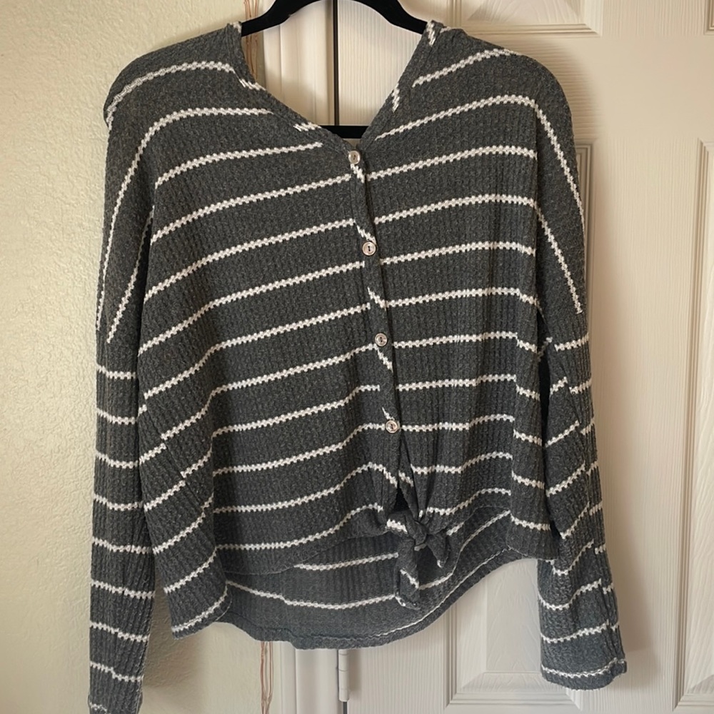 Long sleeve sweater. Grey and white striped size L